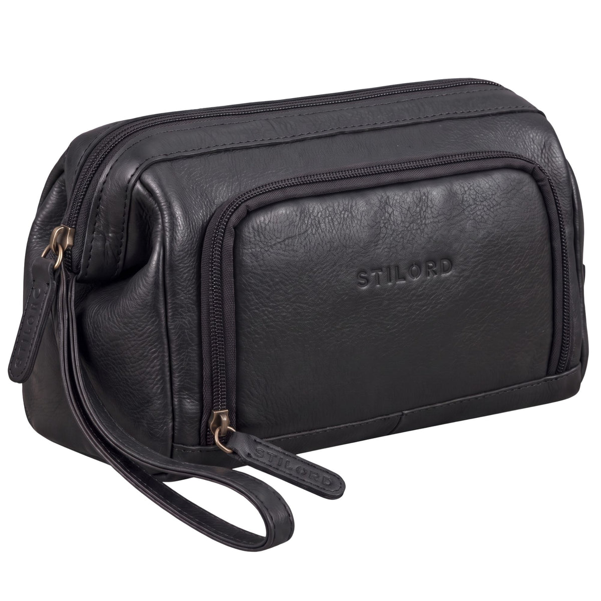 Necessaire em couro preto unissexo, vista frontal com logo STILORD em relevo, zíperes e alça de pulso visíveis