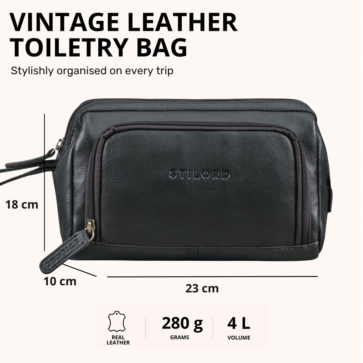Necessaire em couro preto com gravação STILORD, vista frontal com bolso com fecho e marcações de medidas