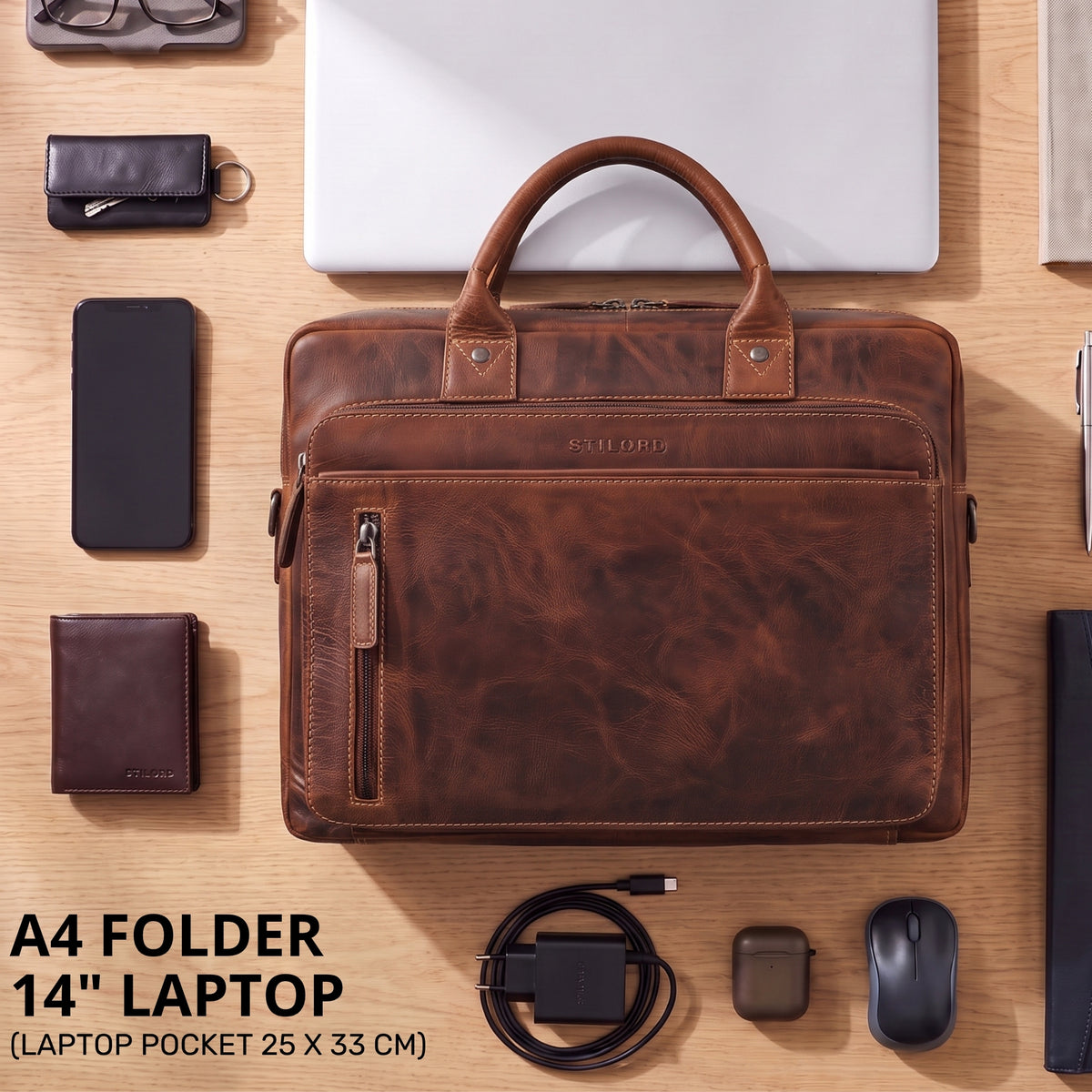 Braune Leder-Business-Tasche mit Laptopfach 14" und A4-Fach, geprägtes STILORD-Logo, Draufsicht mit Zubehör